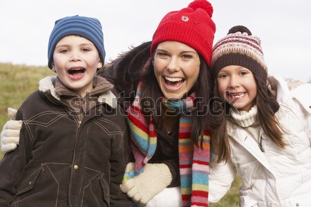 Group Of Female Friends Having Fun In Snowy Landscape Stock photo © monkey_business