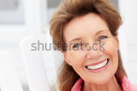 Senior femeie cap spata persoană zâmbitor Imagine de stoc © monkey_business