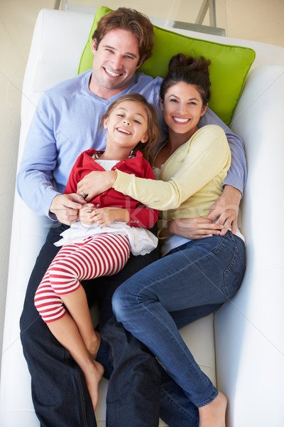 Overhead View Of Family Relaxing On Sofa Stock photo © monkey_business