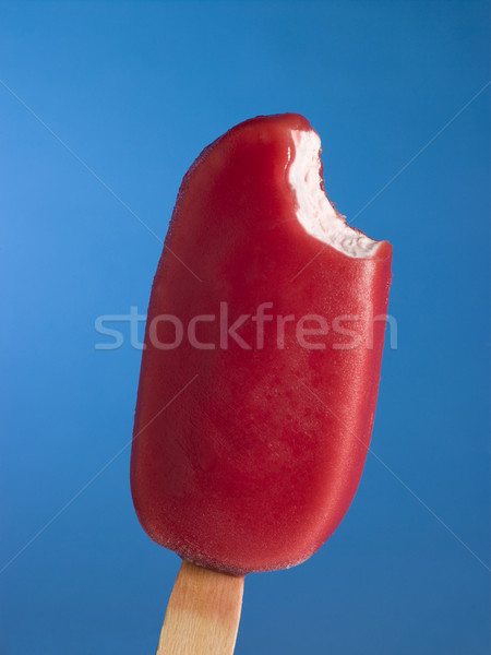 Stock photo: Red Ice Block With A Bite Taken