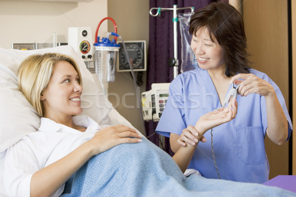 Doctor Taking Pregnant Woman Stock photo © monkey_business