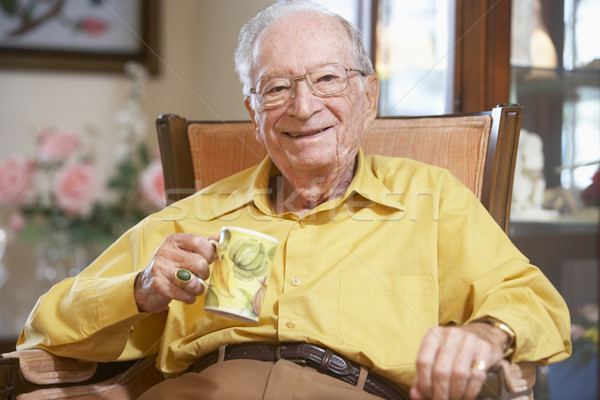 Starszy człowiek pitnej hot napój okulary Zdjęcia stock © monkey_business