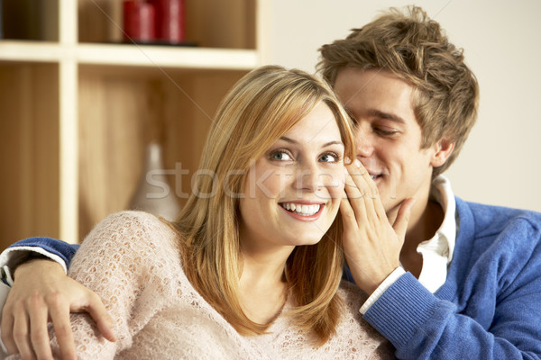 Young Couple Whispering To Each Other Stock photo © monkey_business