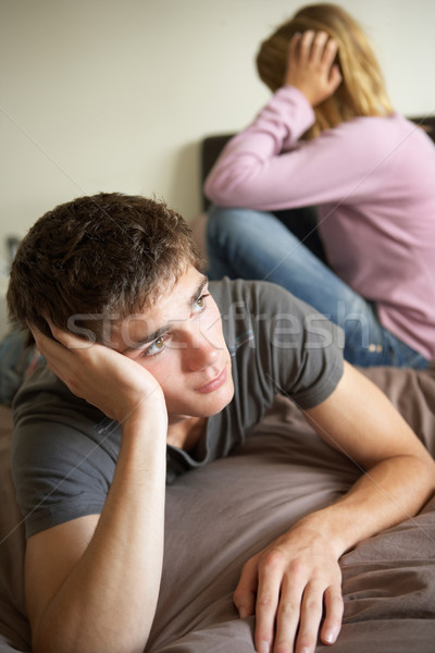 Adolescent couple chambre argument fille triste [[stock_photo]] © monkey_business