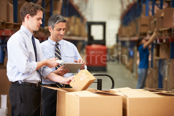 üzletemberek dobozok digitális tabletta szkenner üzlet Stock fotó © monkey_business