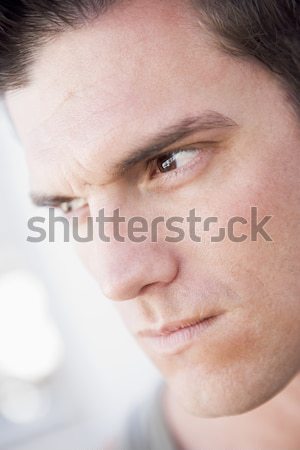 Head shot of man scowling Stock photo © monkey_business