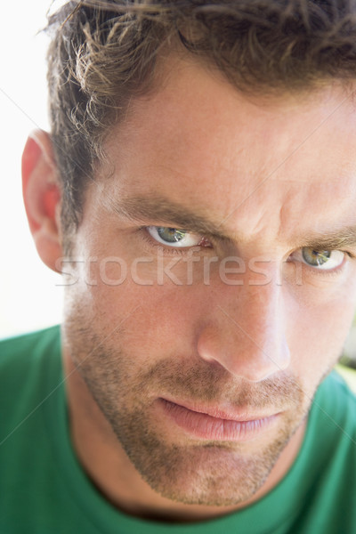 Head shot of man scowling Stock photo © monkey_business