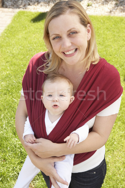 Baby In Sling With Mother Outdoors Stock photo © monkey_business