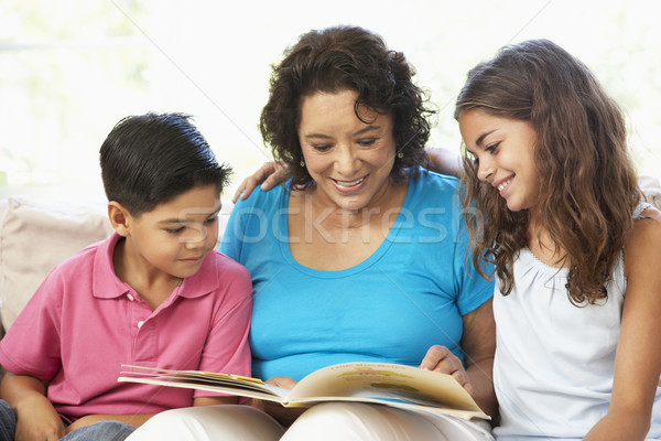 Grandparents With Grandchildren Relaxing At Home Together Stock photo © monkey_business