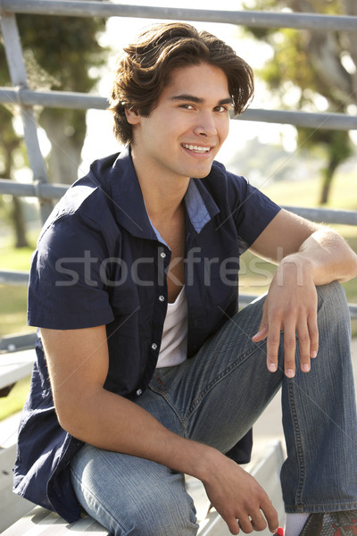 Stock photo: Teenage Girl Sitting On Steps