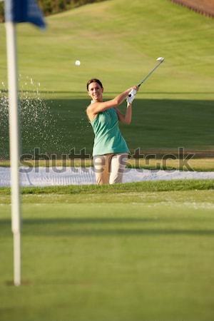 Male Golfer Playing Bunker Shot On Golf Course Stock photo © monkey_business