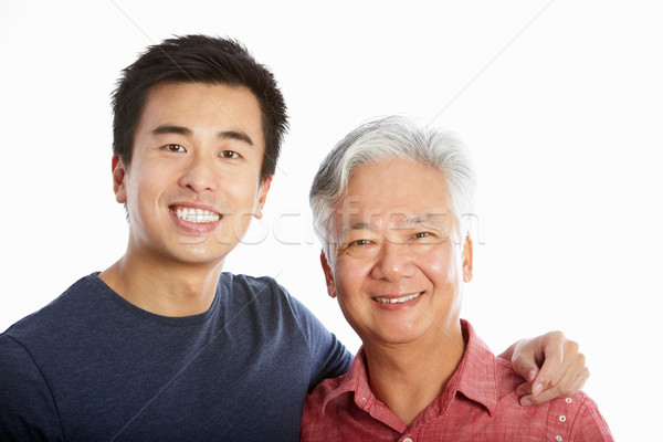 Studio Portrait Of Chinese Father With Adult Son Stock photo © monkey_business