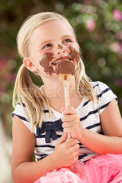 Young Girl Covered In Chocolate Licking Spoon Stock photo © monkey_business