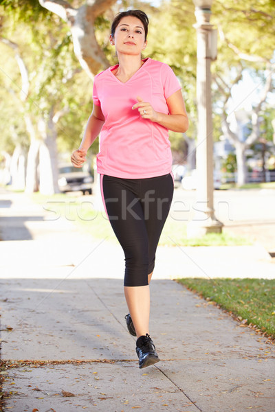 Stockfoto: Vrouwelijke · runner · voorstads- · straat · vrouwen