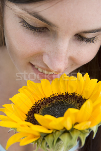 Stock photo: Woman with sunflower