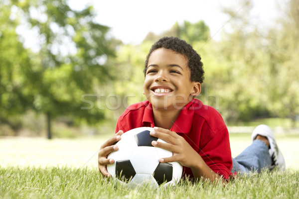 Stock photo: Boy In Park With Football