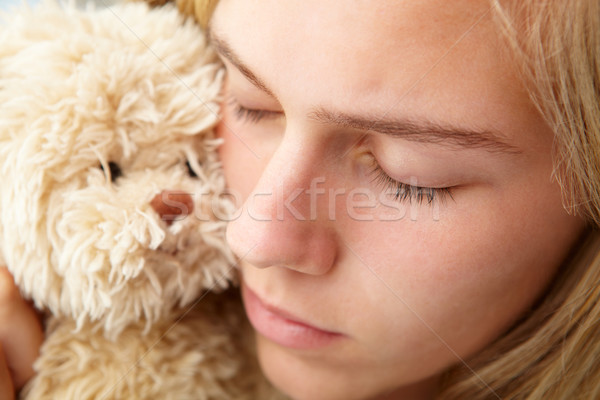 Close up teenage girl with cuddly toy Stock photo © monkey_business