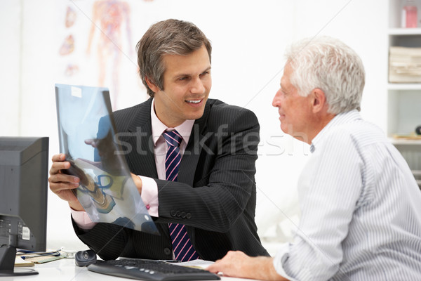 Doctor with senior patient Stock photo © monkey_business