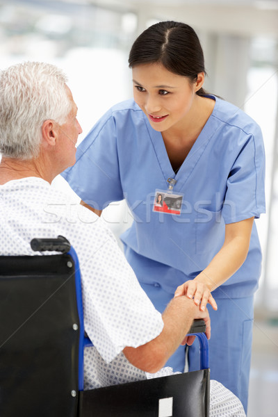 Senior patient with young doctor Stock photo © monkey_business