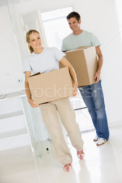 Coppia scatole movimento nuova casa sorridere donna Foto d'archivio © monkey_business