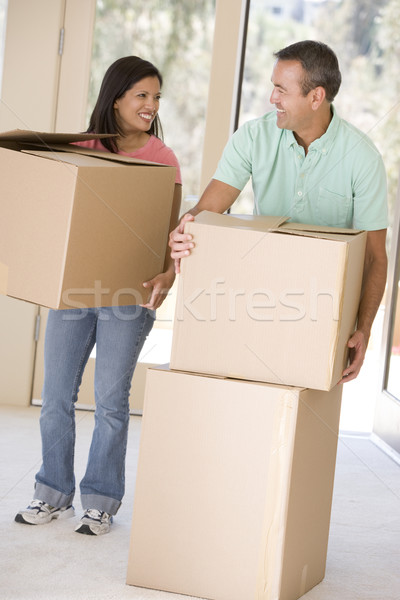 Pár dobozok mozog új otthon mosolyog nő Stock fotó © monkey_business