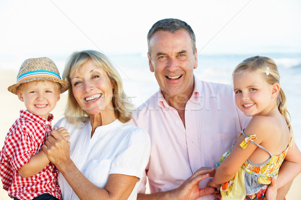 Grands-parents petits enfants vacances à la plage femmes heureux [[stock_photo]] © monkey_business