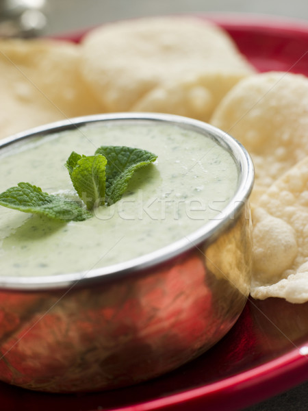 Fresh Green Yoghurt Chutney with mini Papadoms Stock photo © monkey_business