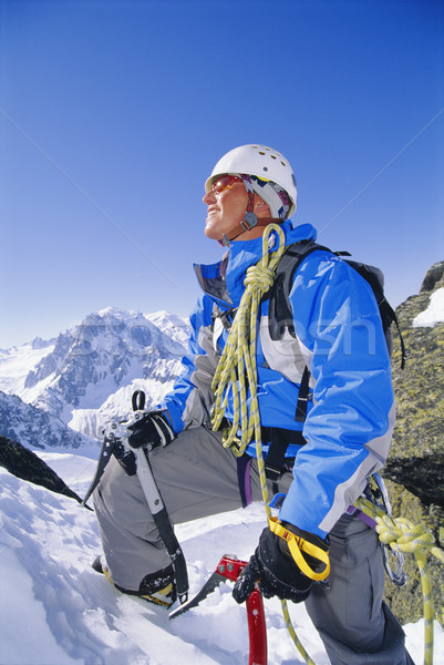Fiatalember hegymászás csúcs hó kék ég mászik Stock fotó © monkey_business