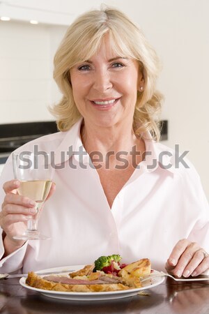 Nő vacsora vendégekkel boldog vacsora személy mosolyog Stock fotó © monkey_business