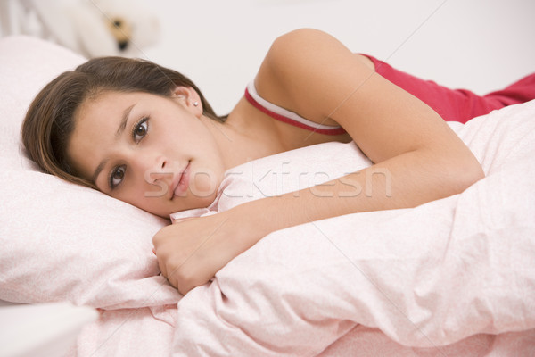 Tinilány ágy néz beteg lány tinédzser Stock fotó © monkey_business