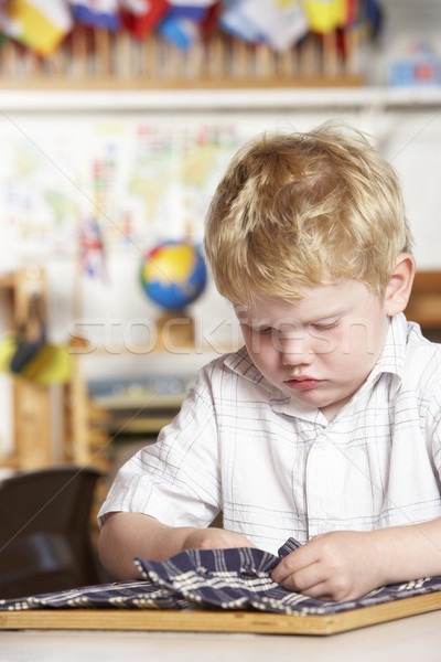 Adult Helping Two Young Children at Montessori/Pre-School Stock photo © monkey_business