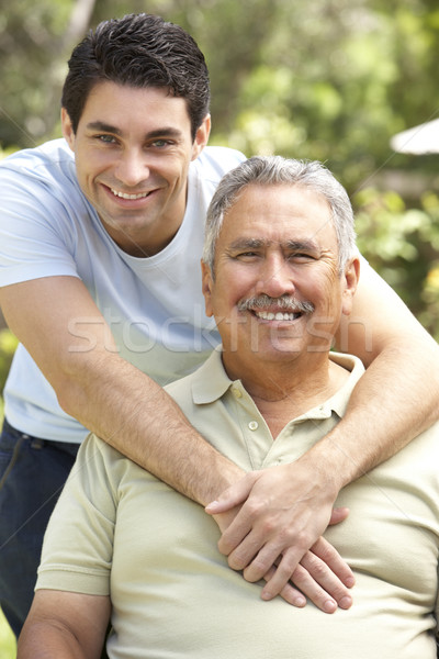 Senior Man With Adult Son In Garden Stock photo © monkey_business
