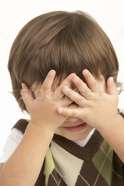 Studio Portrait Of Young Boy Covering Eyes Stock photo © monkey_business