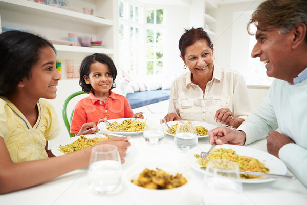 Indian grands-parents petits enfants manger repas maison [[stock_photo]] © monkey_business