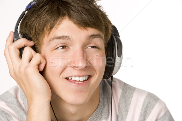 Teenage Boy Listening To Music On Headphones Stock photo © monkey_business