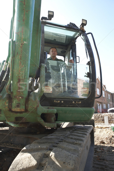 Construction Worker Using Digger Stock photo © monkey_business
