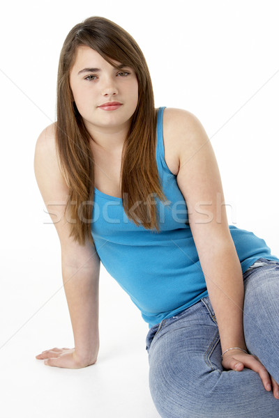 Stock photo: Studio Portrait Of Serious Teenage Girl