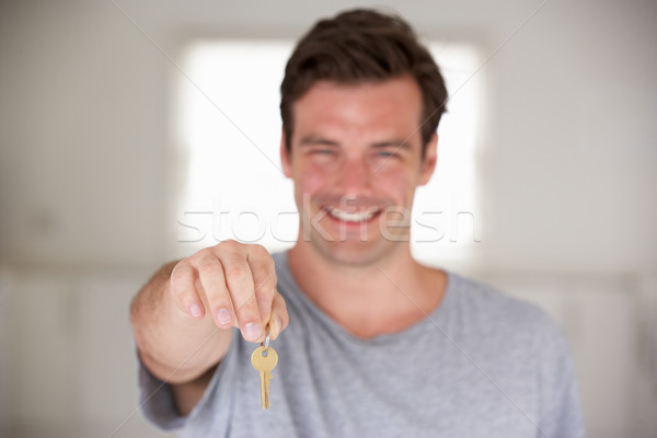 Man moving into new home Stock photo © monkey_business