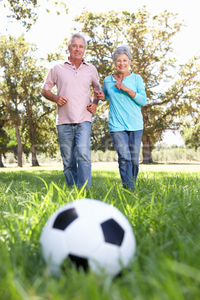 Senior Couple Playing Football Stock Photo C Monkey Business