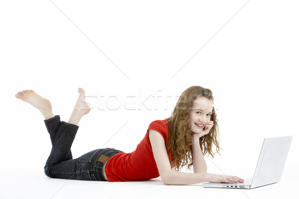 Jeune fille utilisant un ordinateur portable ordinateur fille enfants enfant Photo stock © monkey_business