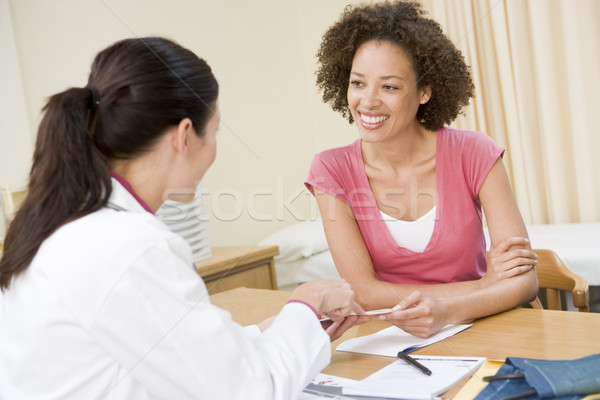 женщину улыбающаяся женщина улыбаясь врач счастливым Сток-фото © monkey_business