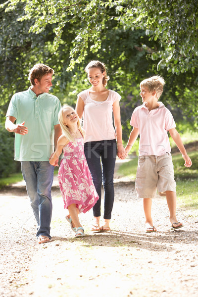 Famille marche campagne ensemble enfant jardin [[stock_photo]] © monkey_business