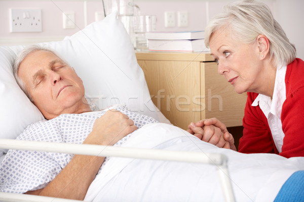 Senior woman visiting husband in hospital Stock photo © monkey_business