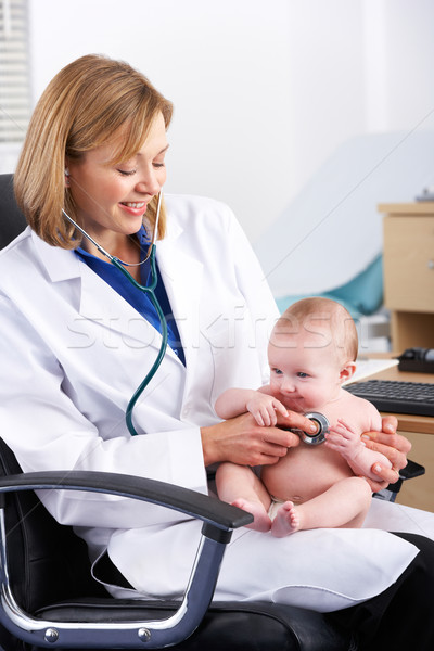 American doctor examining baby Stock photo © monkey_business