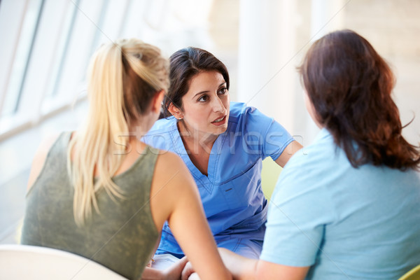 Enfermera reunión madre hospital mujer Foto stock © monkey_business