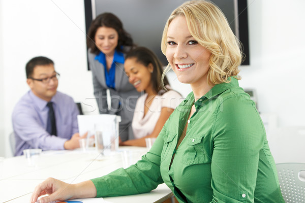 Portrait Of Businesswoman In Boardroom With Colleagues Stock photo © monkey_business