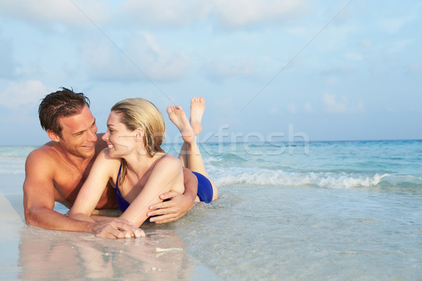 Romántica Pareja mar playa tropical vacaciones playa Foto stock © monkey_business