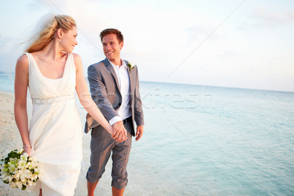 Bride And Groom Getting Married In Beach Ceremony Stock photo © monkey_business