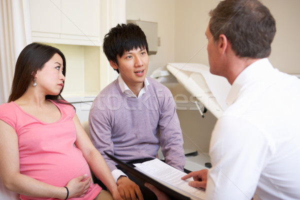 Stock photo: Couple Meeting With Obstetrician In Clinic