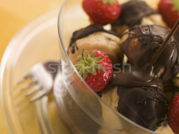 Chocolate Profiteroles with Strawberries and Chocolate Sauce Stock photo © monkey_business